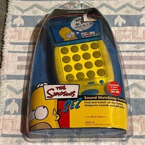 Sealed 2002 The Simpsons Sez Sound Matching Handheld Game Tiger